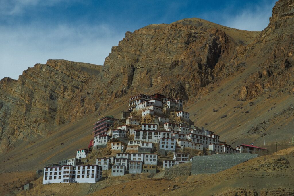 Key Monastery nestled in the rugged hills of Spiti Valley, showcasing stunning Buddhist architecture.